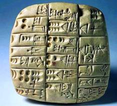 Tablilla-sumeria-con-escritura-cuneiforme.jpg